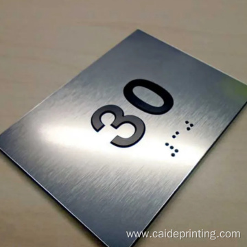 Custom designed ADA braille room number